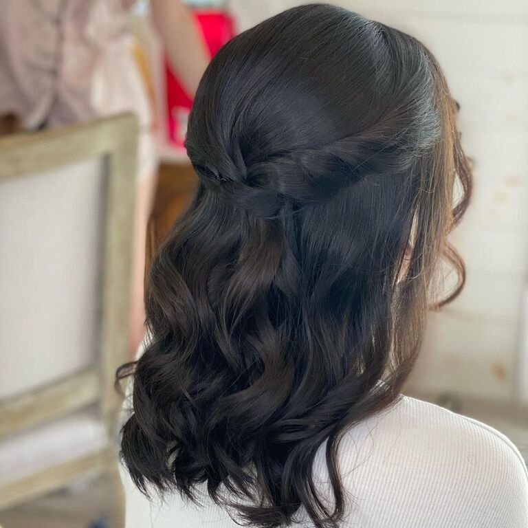 Twisted back medium length bridesmaid hairstyle