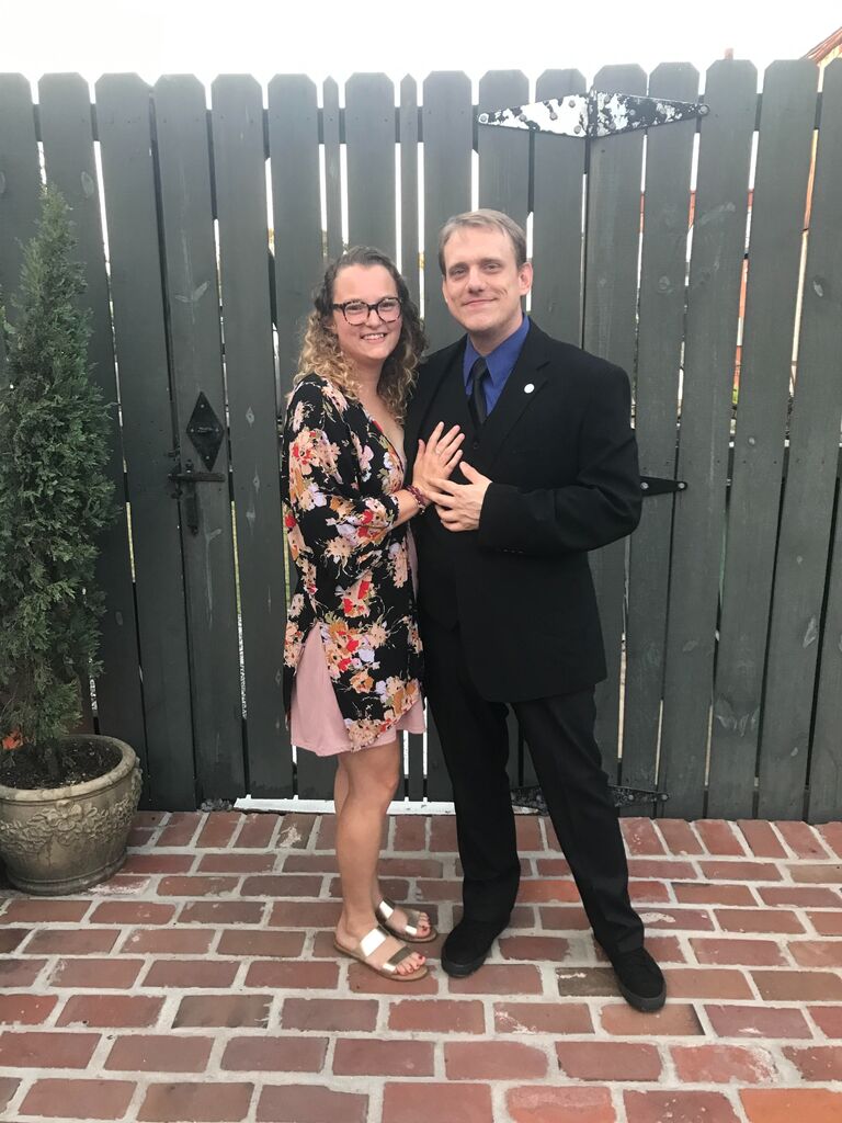 They attend their first wedding together!