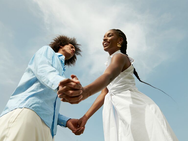 Couple holding hands