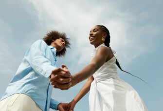 Couple holding hands