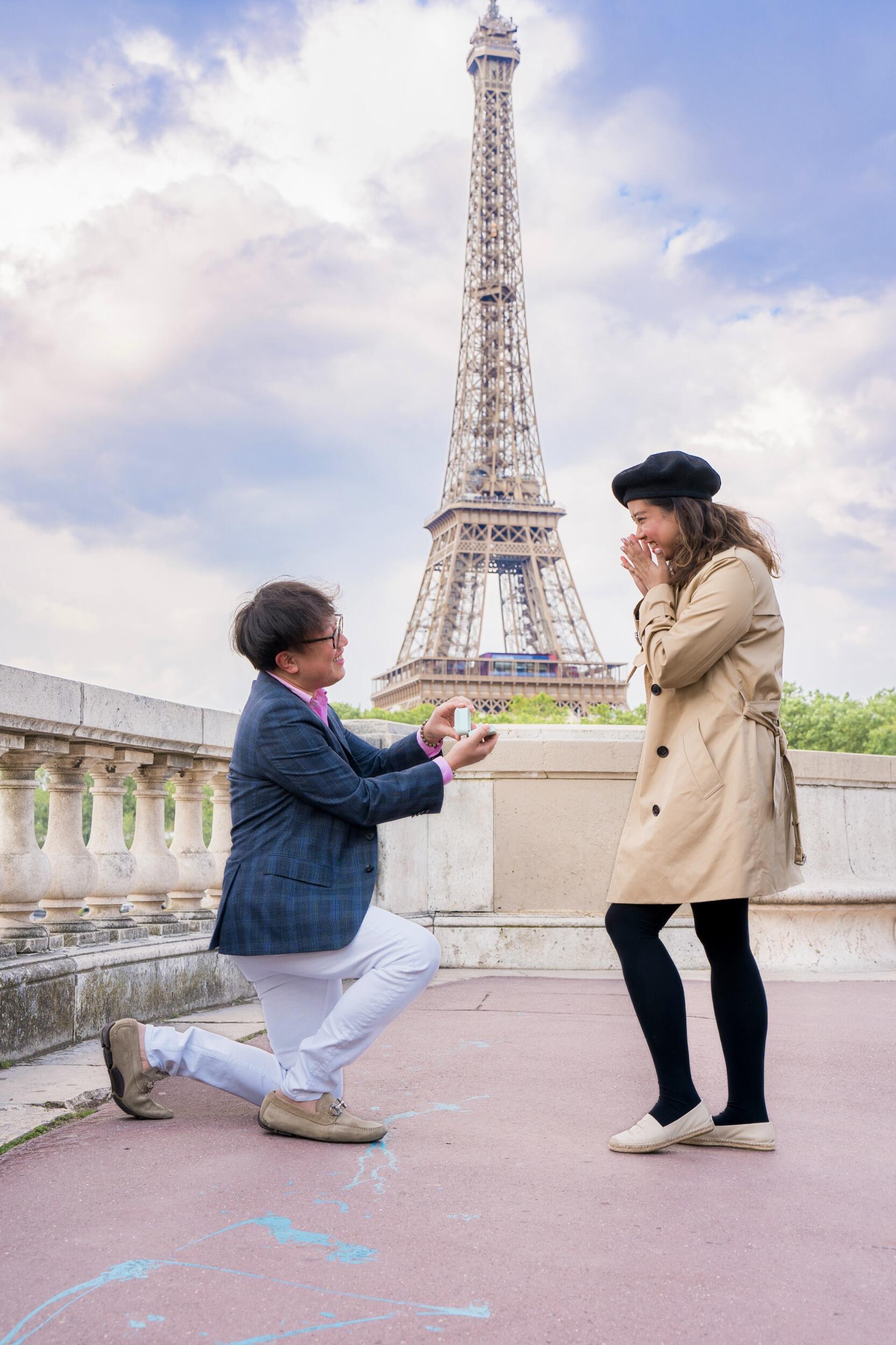 Andy planned a beautiful proposal in front of the Eiffel Tower. He got down on his knee and asked Cookie to be his "permanent roommate"! 