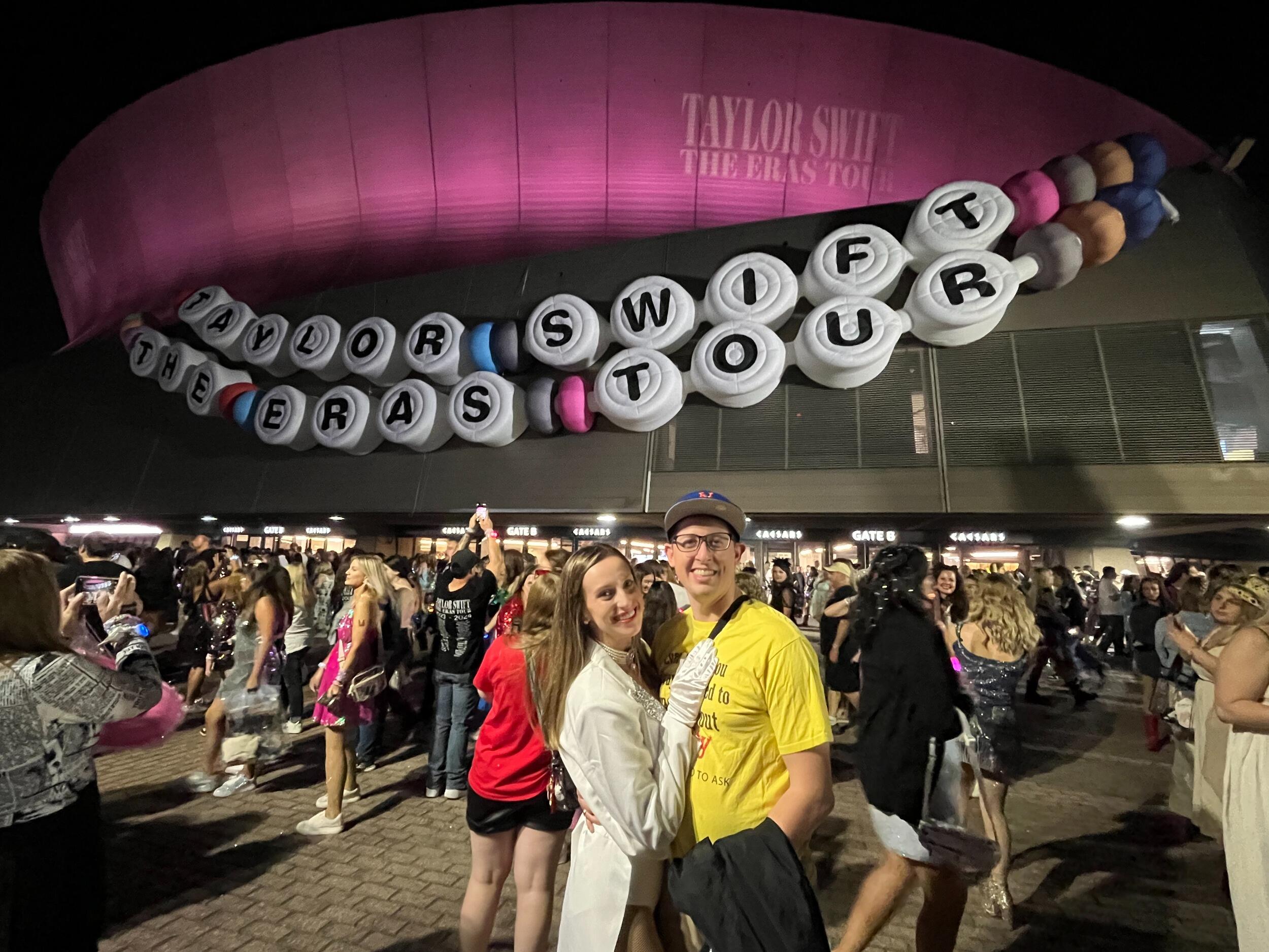 Kirsten and Tyler attend their final Eras Tour show in New Orleans with Mallory. Tyler rewears his costume from the Stockholm show, and his niche reference costume (Jack Antonoff during the making of "Getaway Car") is a bigger hit in the States than overseas.