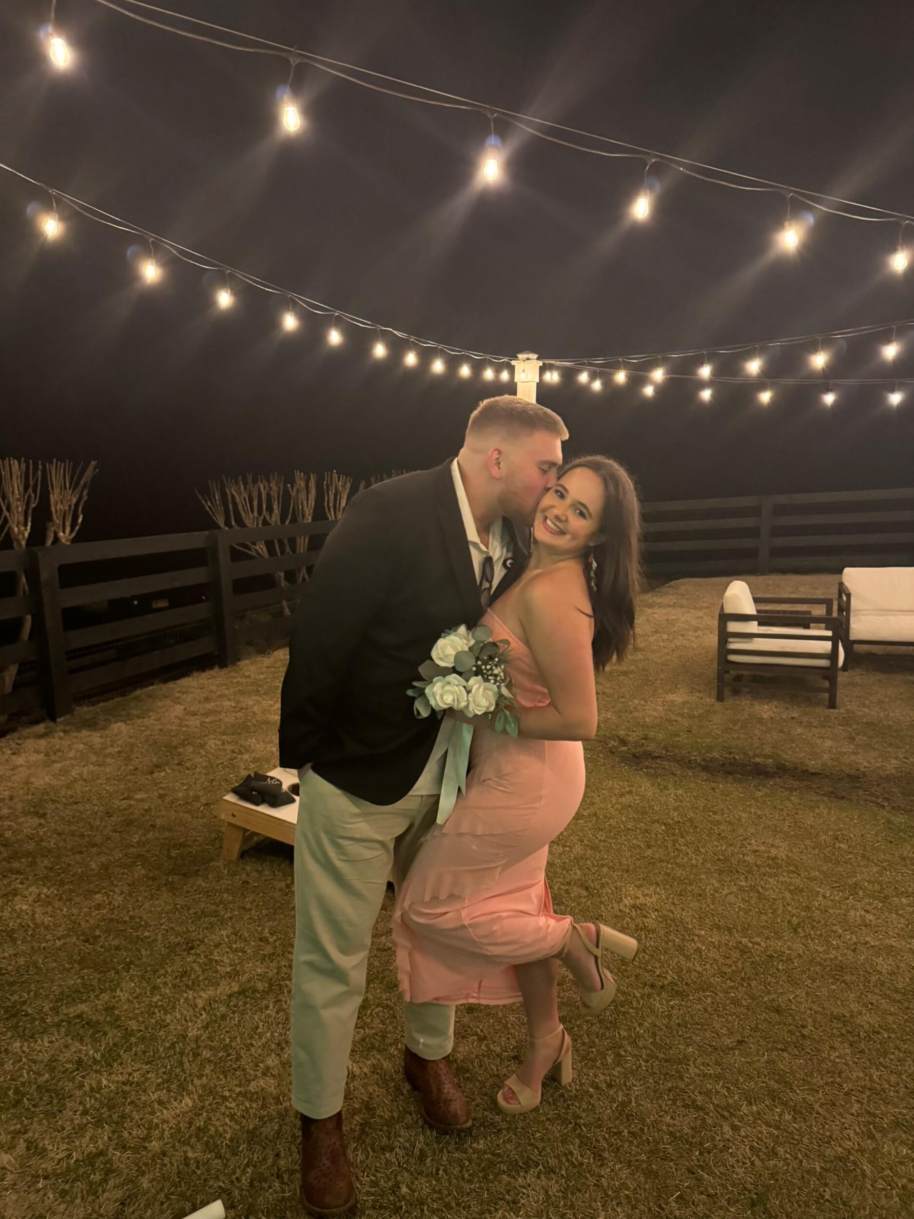 Our first wedding together (Mackenzie caught the bouquet)!