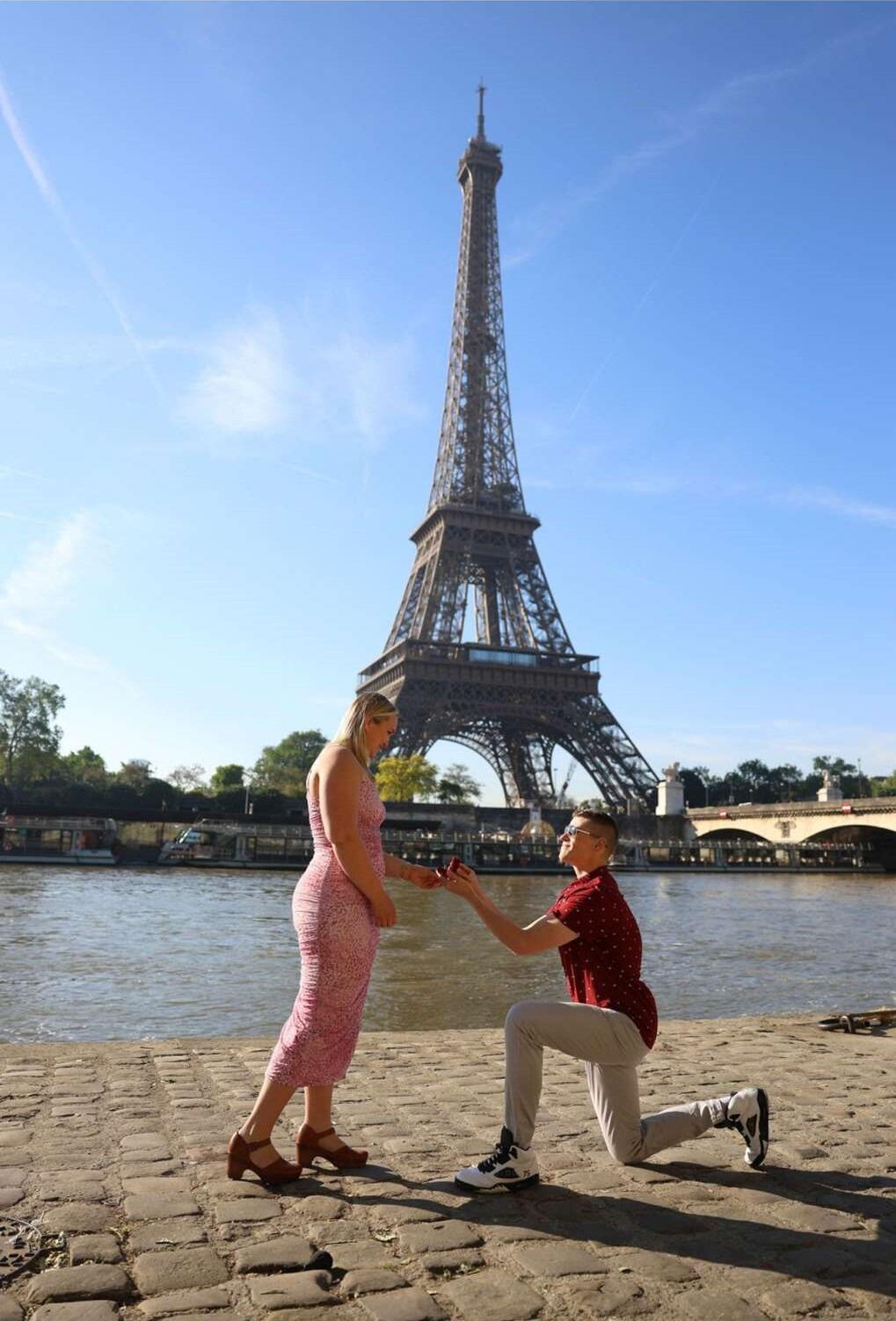 Kevin proposes to Emily in front of the Eiffel Tower on their trip to Paris, France. Following this perfect moment, Kevin surprised Emily with tickets to see Taylor Swift perform later that night. 
