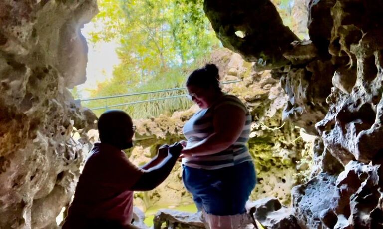 When Sara & Colin reached the bottom, there was a lovely waterfall into a quiet pond. There, Colin surprised Sara by proposing with a beautiful ring in a felt turtle box. 