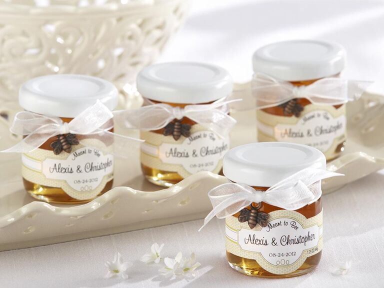 Custom honey with label that says 'Made to bee' and small bee charm