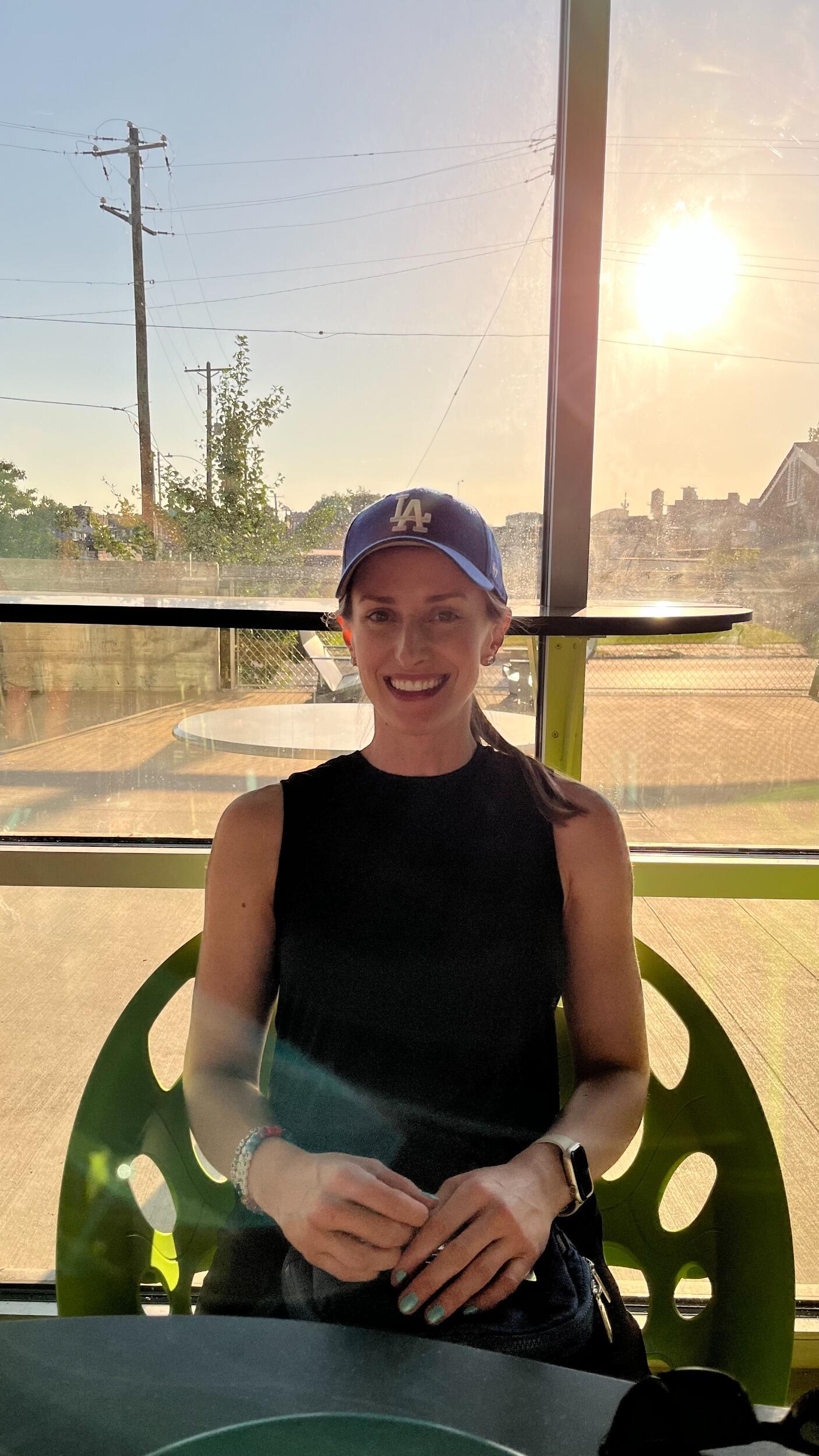 Former baseball hater Kirsten spends her own money on a Los Angeles Dodgers hat, and then proceeds to wear it in public. Tyler jokes that this is when he knew for sure that Kirsten really loved him.