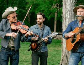 Three country musicians playing at a wedding ceremony. 