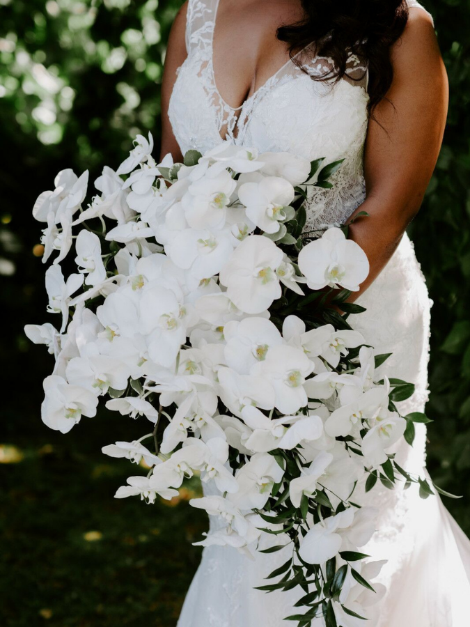White cascading bouquet with orchids