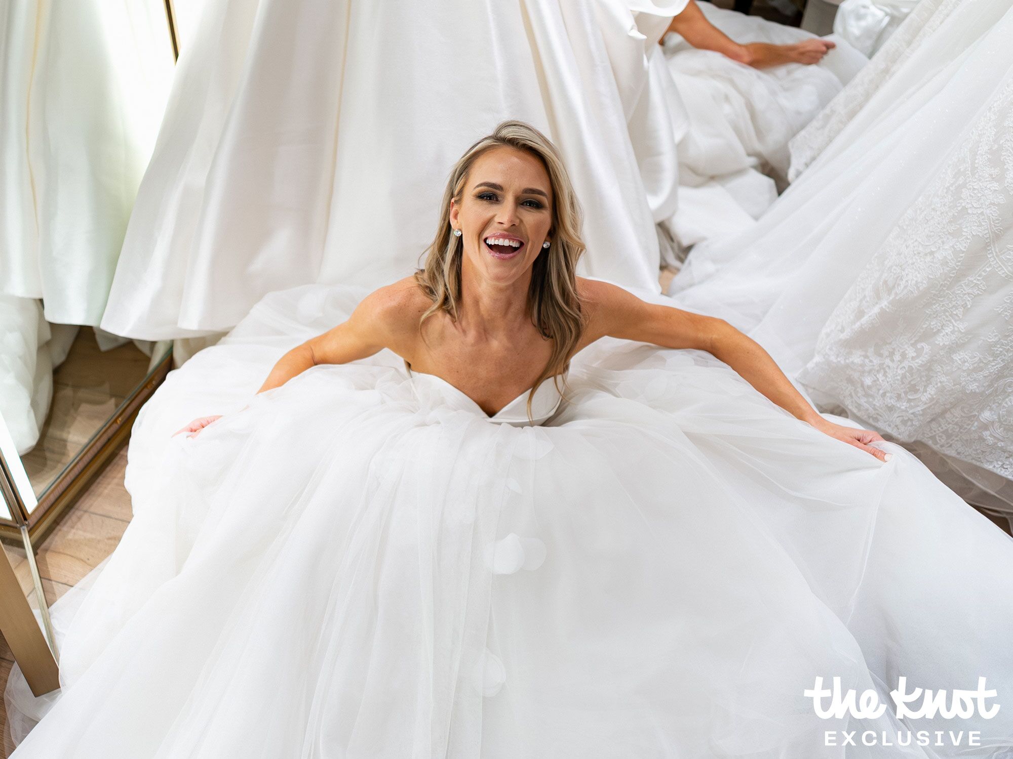 Olivia Flowers trying on wedding dresses at Pronovias