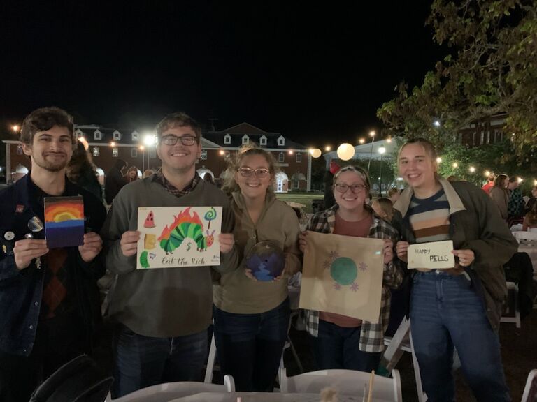 Shawn, Emma and friends are painting pictures at Coffee & Canvas night at the university! Shawn is clearly a great artist!