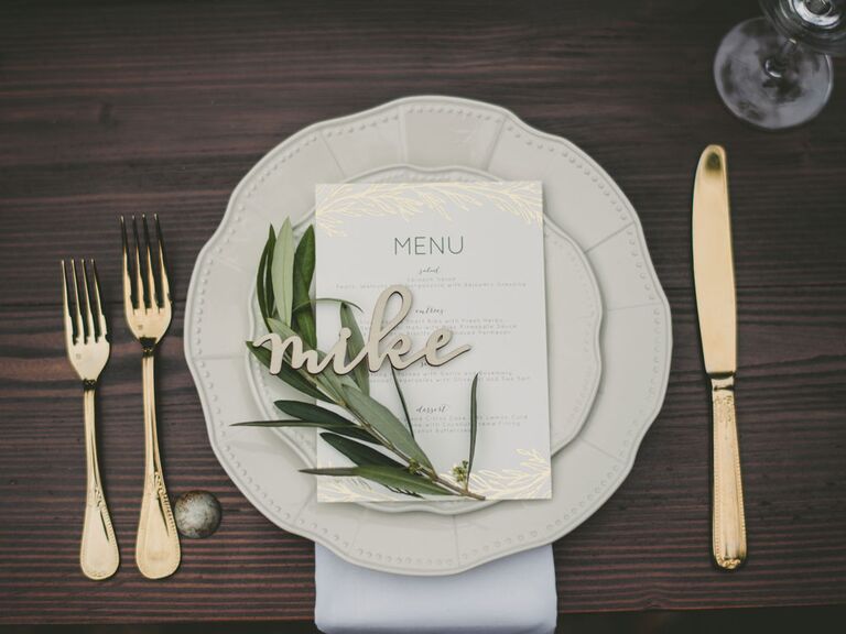 Rustic place setting with wood name card at barn wedding 