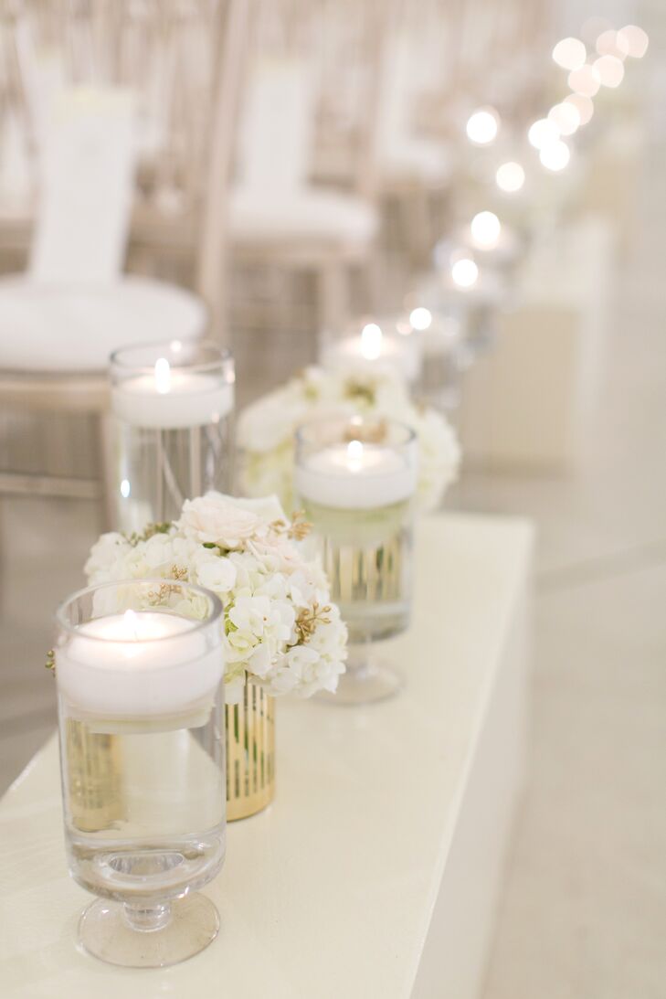 Aisle Decorations Made Of Floating Candles And Hydrangea Flower