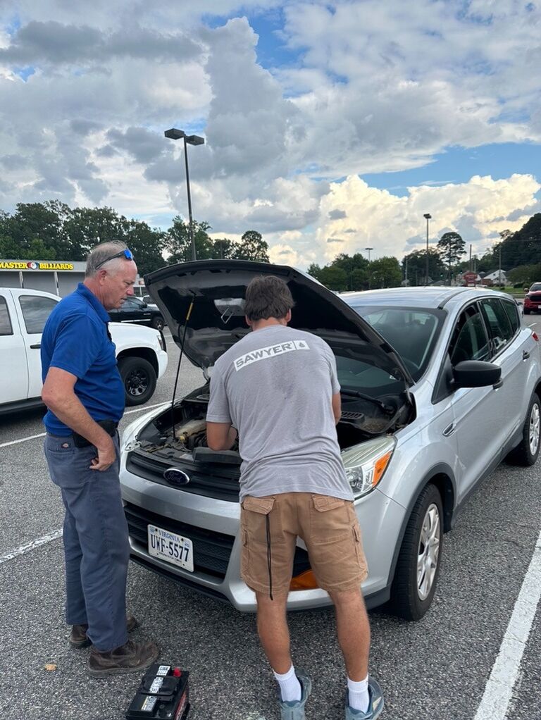 Barry and Lucas helping out their girl after a long day at work!