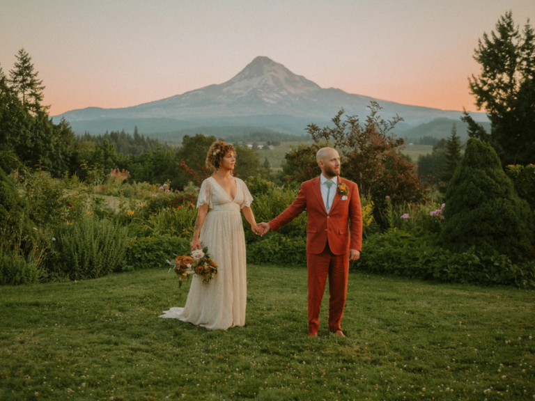 Bride and groom holding hands at outdoor wedding ceremony, how to get married in Oregon