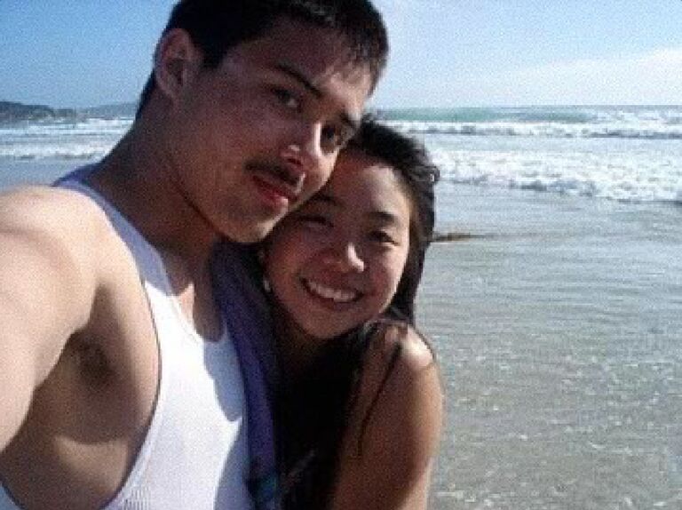 Thao & Jose in their own circle (as friends), even though it was a group beach day