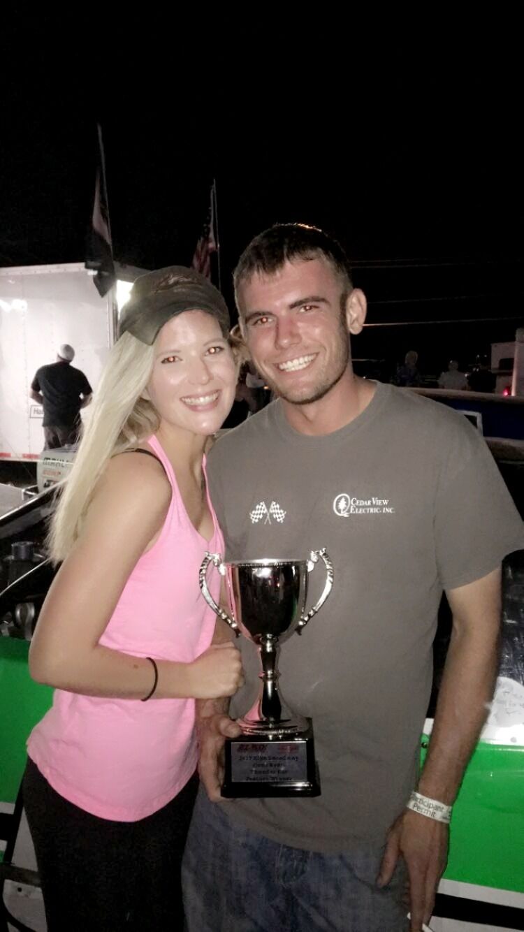 Matt won a race!! 
I ended up going back to the track with Mike to watch Matt race.... and that night Matt won! I was still a secret at this time, but people started asking questions... People would ask Matt "Who is that blonde chick in your victory lane photo?" or "Who was that blonde chick that was talking to you?" 