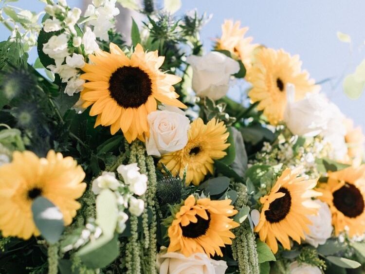Sunflowers in wedding ceremony flower arrangement