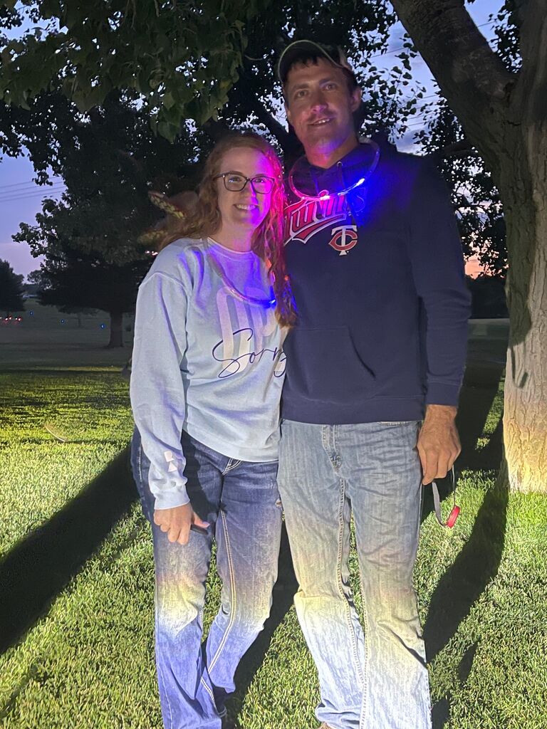 First picture together at Ray's glowball golf tournament, which was one week after a Williston glowball outing where we decided we should start dating....after a perfect setup assist from Alison to give Eric a push in the right direction to ask her out. 