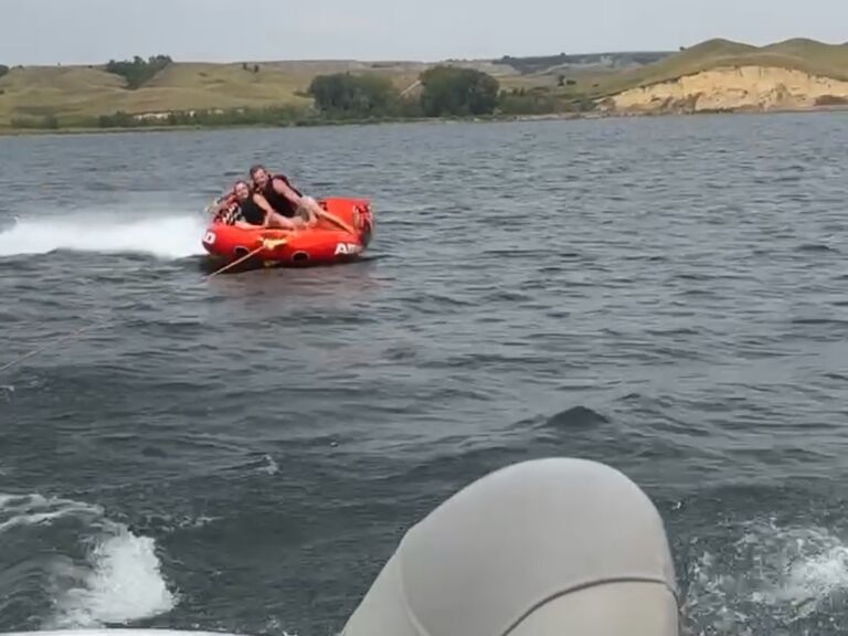 Boating and camping with the Eriksmoen's in New Town. 
