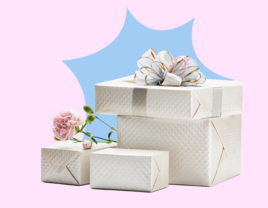Wrapped wedding gift on pink and blue background