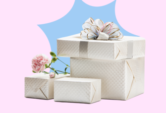 Wrapped wedding gift on pink and blue background