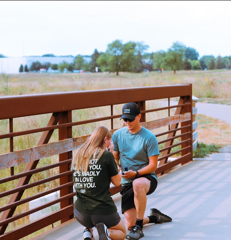 David proposed on the Rice Creek North Regional trail in Shoreview, and it caught Cassie totally by surprise! She said yes (of course)! It was a special moment and Cassie cried... a lot.