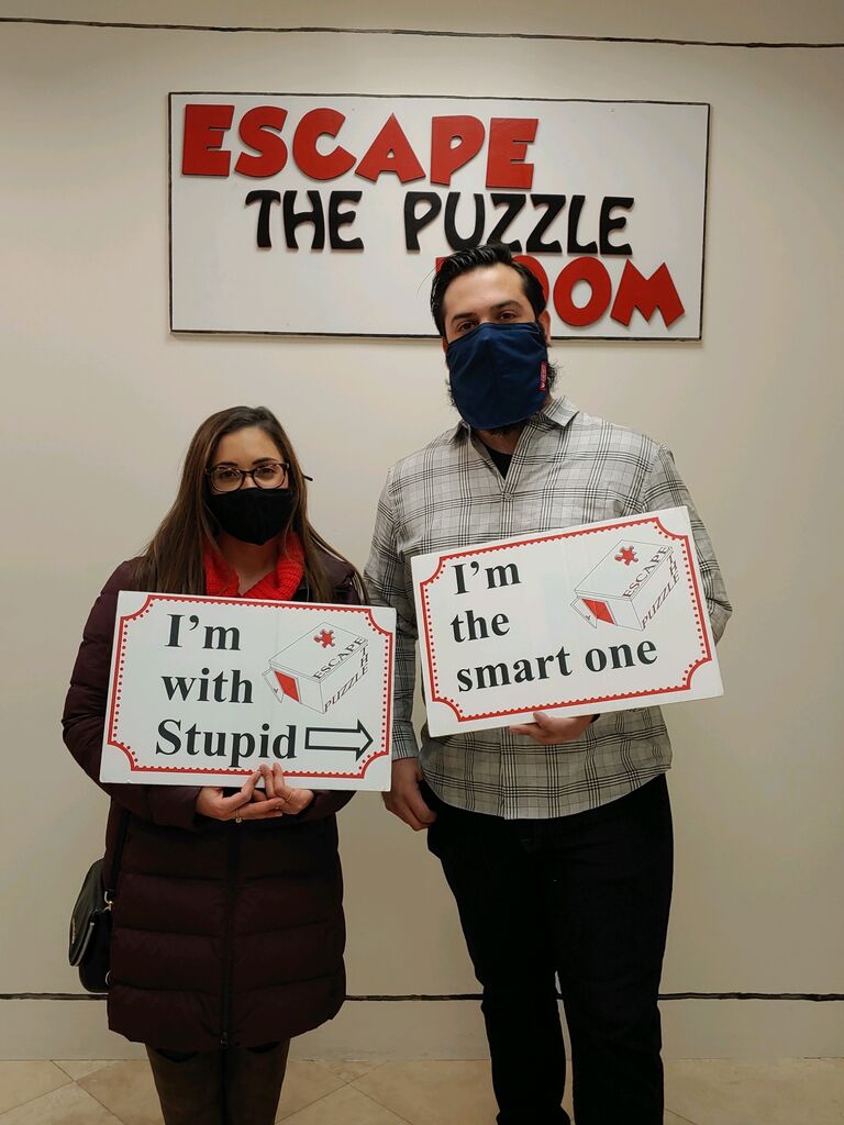 We matched on a dating app in January but didn't go on our first date until February. This is our first photo together on our second date after successfully escaping the escape room!