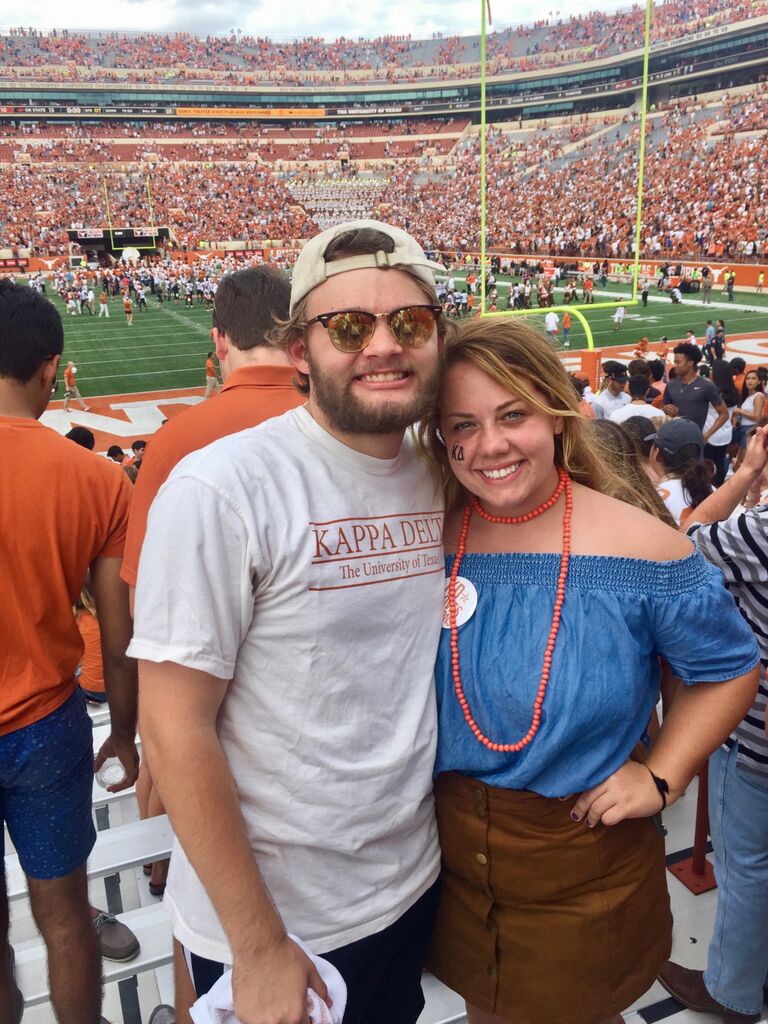 Zach being a good sport and repping burnt orange at a UT football game freshman year. 