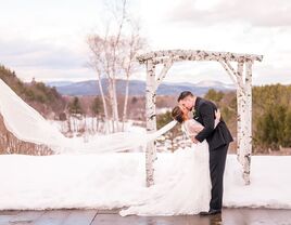 Couple kissing in the winter landscape