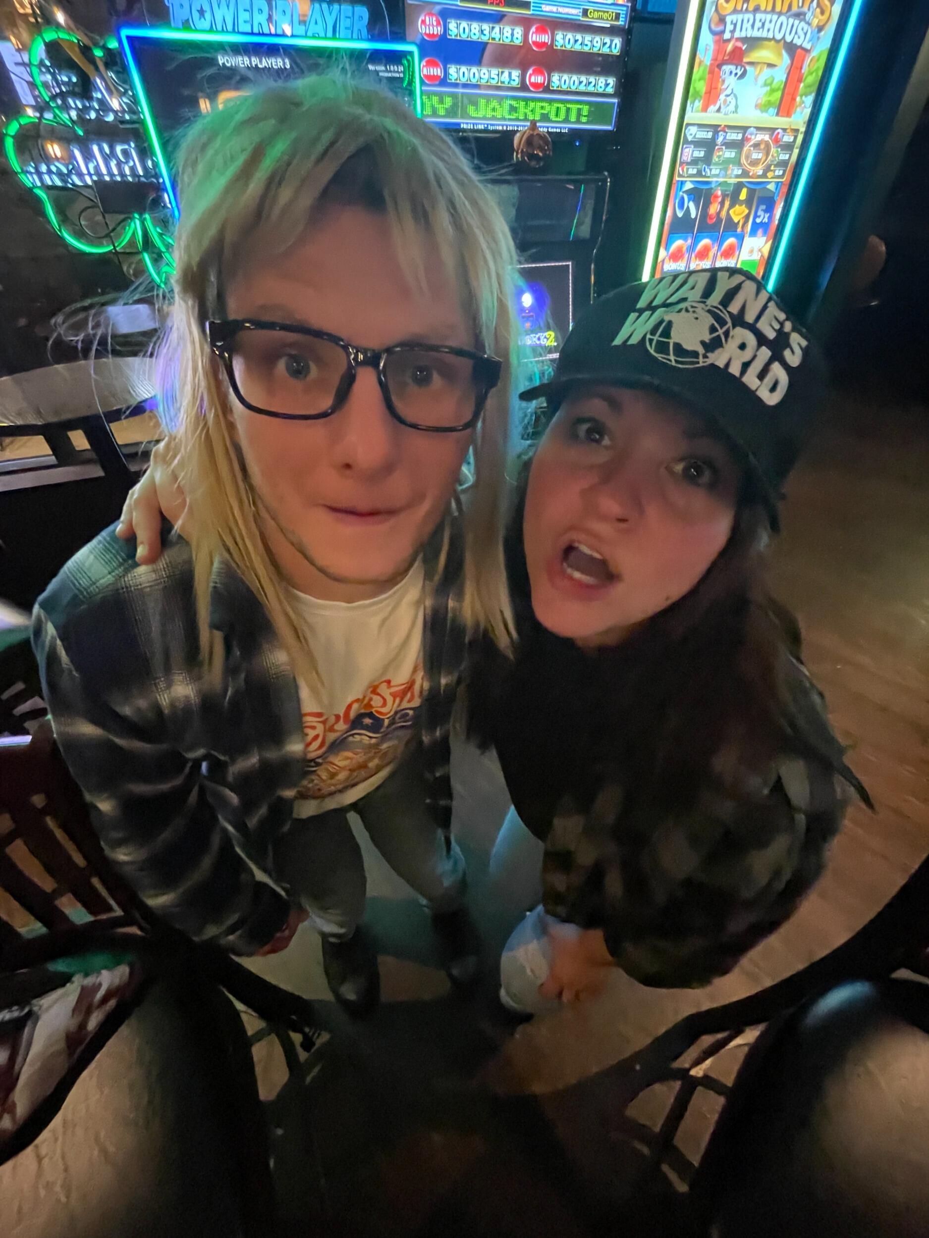 Jessica and Justin also realized they make a great pair in couples costumes! Here we are as Wayne and Garth from Wayne's World for Halloween 2023. Another combo we did was Where's Waldo and Where in the World is Carmen San Diego? for Halloween 2024.