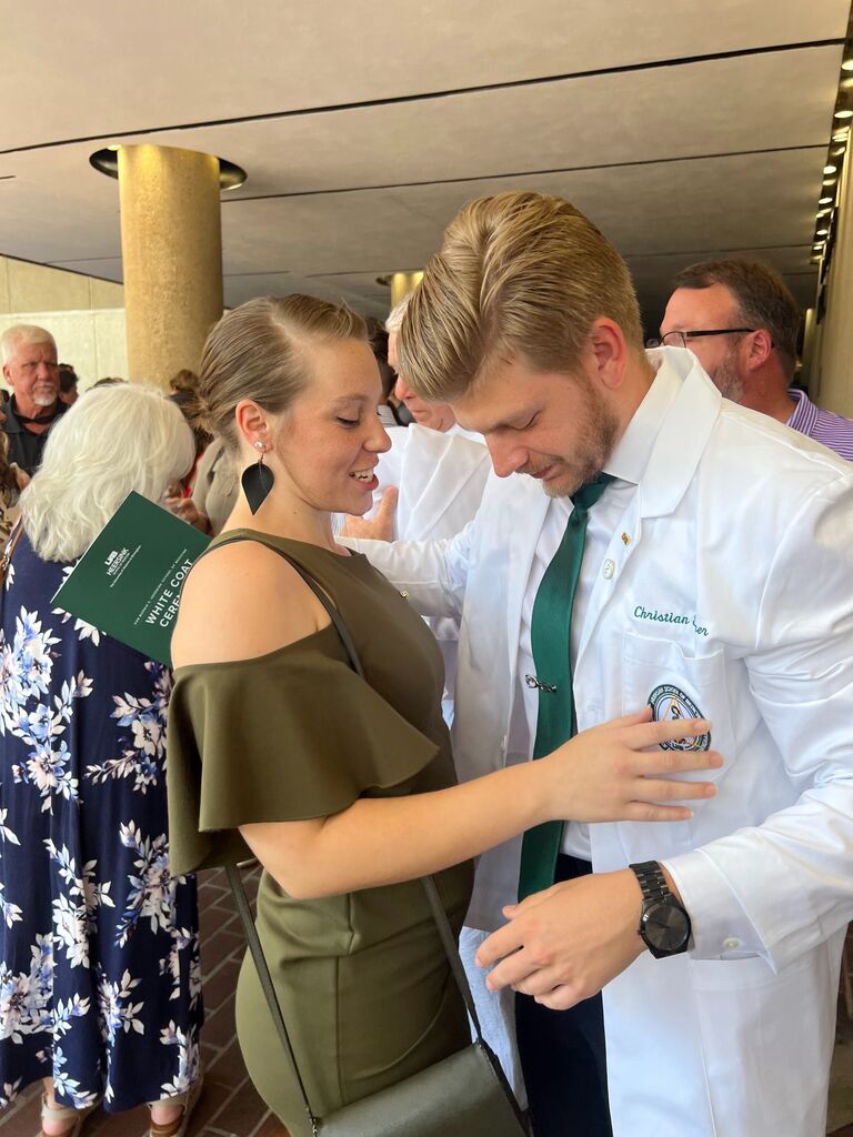 White Coat! Christian is officially on his way to being a doctor