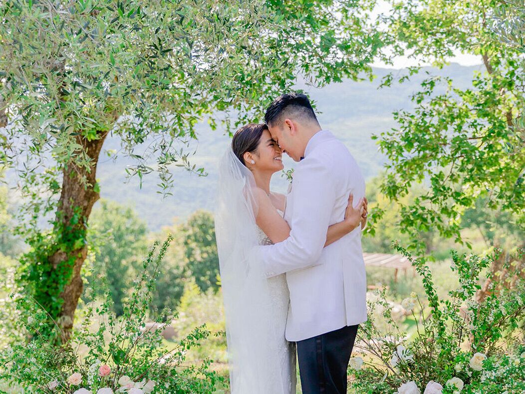 Couple embracing at micro wedding in Italy