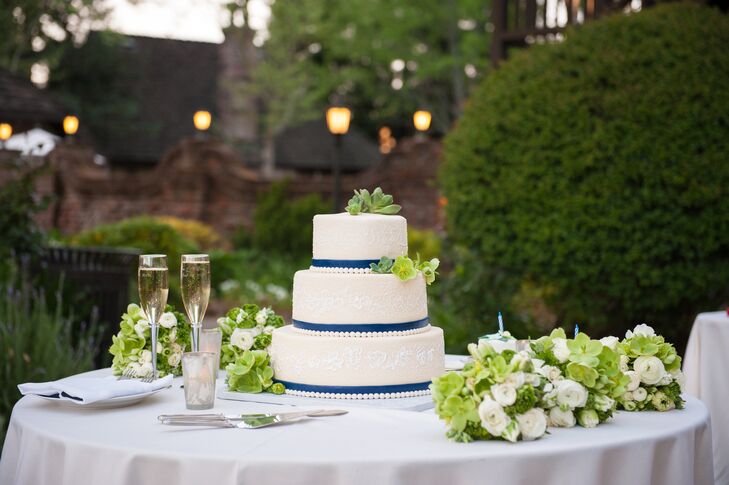 Ivory Cake Wrapped With Blue Ribbon