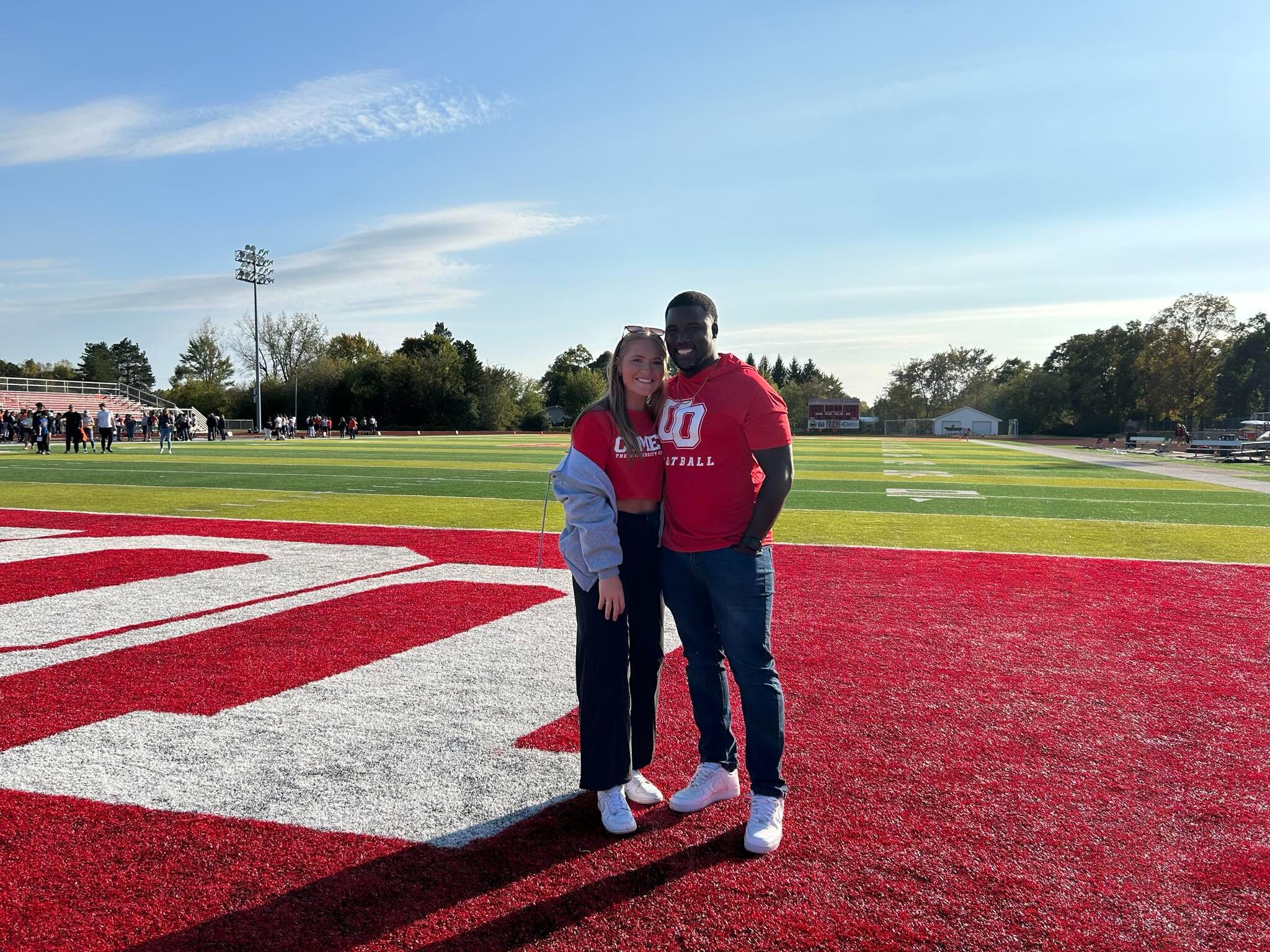 Sam and Thomas back at Thomas's Alma Mater, where he got to show her around and introduce her to a lot of his friends and coaches.