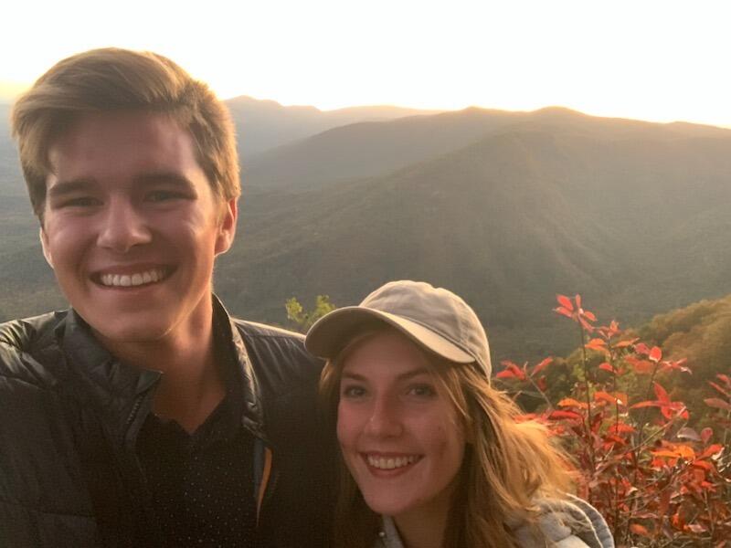 First picture together, watching the sunset at an overlook spot nearby. Caleb made her dinner and brought it all the way up the mountain :)