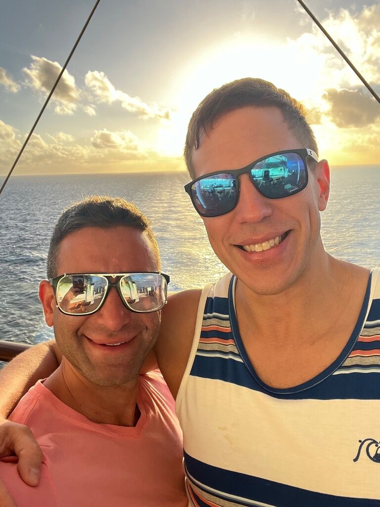 Watching the sunset aboard a cruise in Cozumel, Mexico (this is when they realized their passion of traveling together)