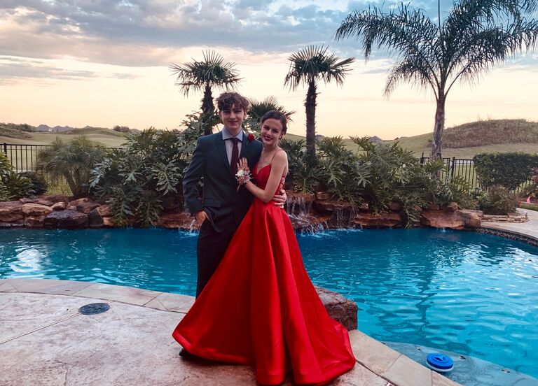 Our backyard prom! Sebastian put this day together for us because our prom was cancelled. He set up lights, music and ordered Cheesecake factory. Was better than the real prom anyways.