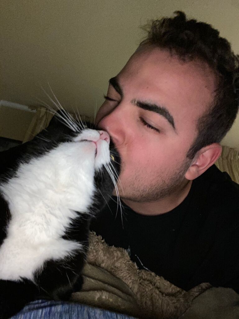 Christopher fully adopts Ms. Kitty as his own