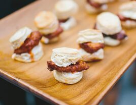 Southern wedding food idea with a fancy take on fried chicken and biscuit sliders 