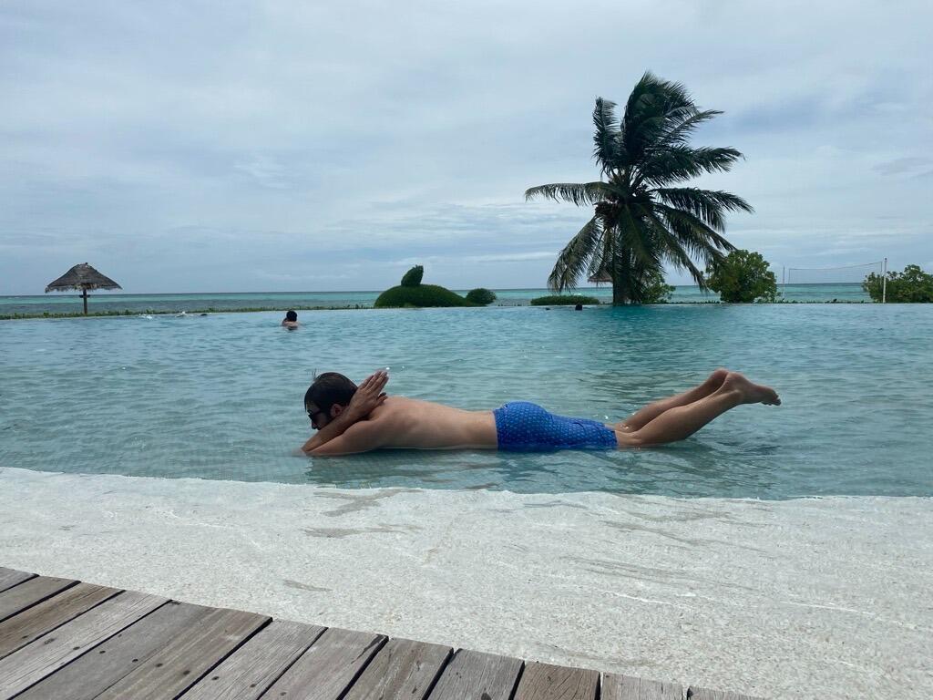 Taylor mimics an Orca on our first (and hopefully not last) trip to the Maldives