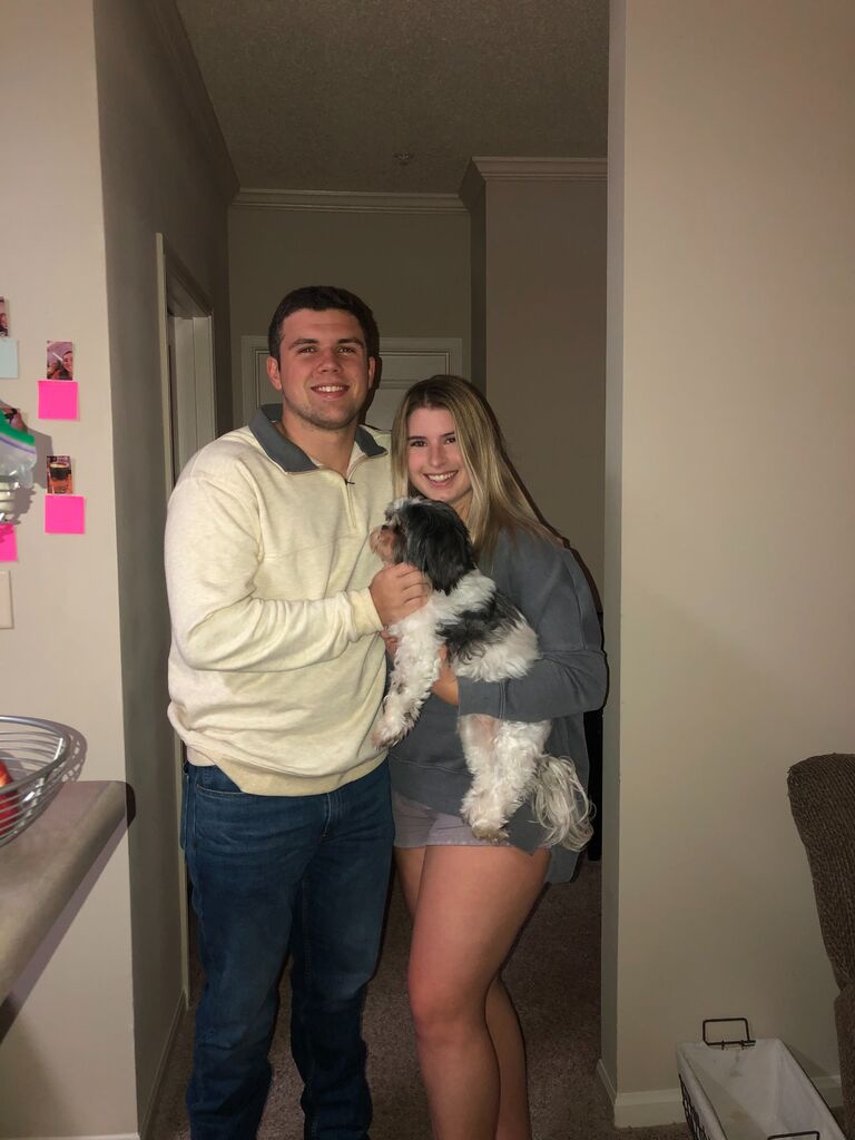 Our 1 year anniversary. Puppy had to be in the photo of course!