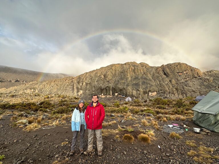 Hiking up Kilimanjaro, and we caught a beautiful rainbow. 