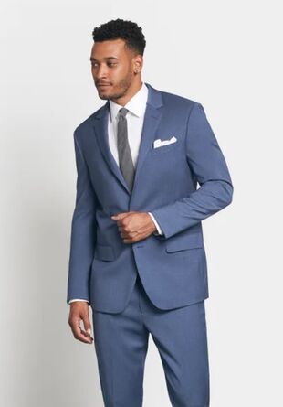 man in blue suit with gray tie