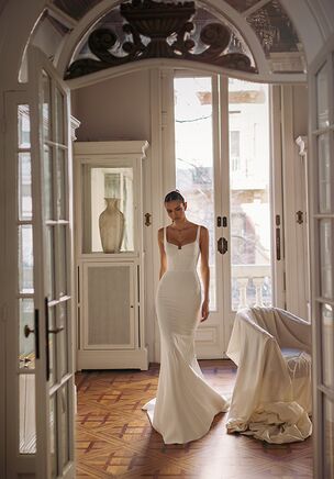 Tali - round cutout in the middle neckline strapped top with open back and smooth mermaid tail flowing bottom.