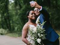 newlyweds taking a selfie