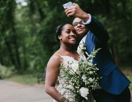 newlyweds taking a selfie