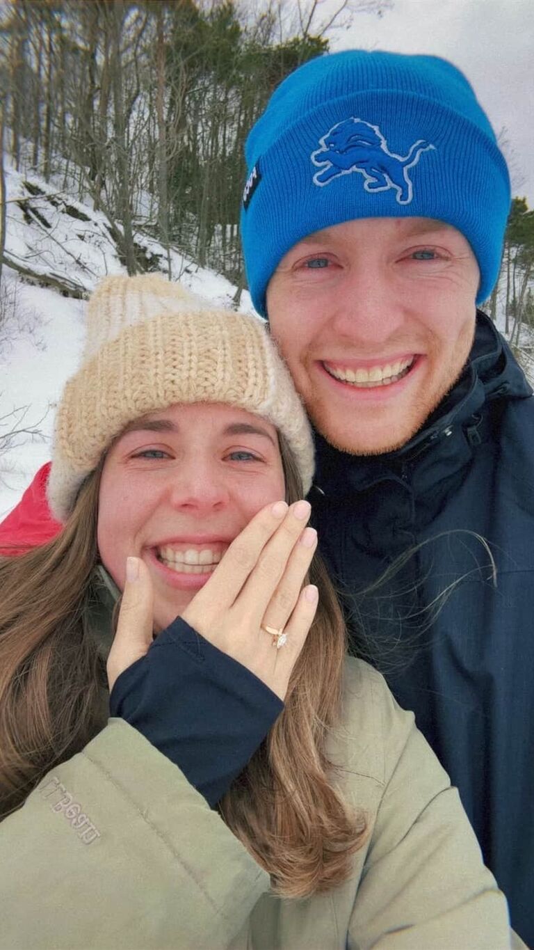 We were engaged on a beautiful snowy day where we took a walk through Saugatuck Dunes! 