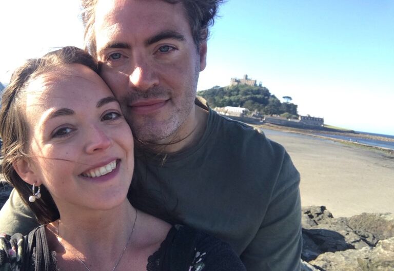 Their first trip away together—beautiful Cornwall. A memorable one. They took this photo, both feeling so happy and grateful to have found each other. St. Michael's Mount (behind them) will make an exciting reappearance later on...