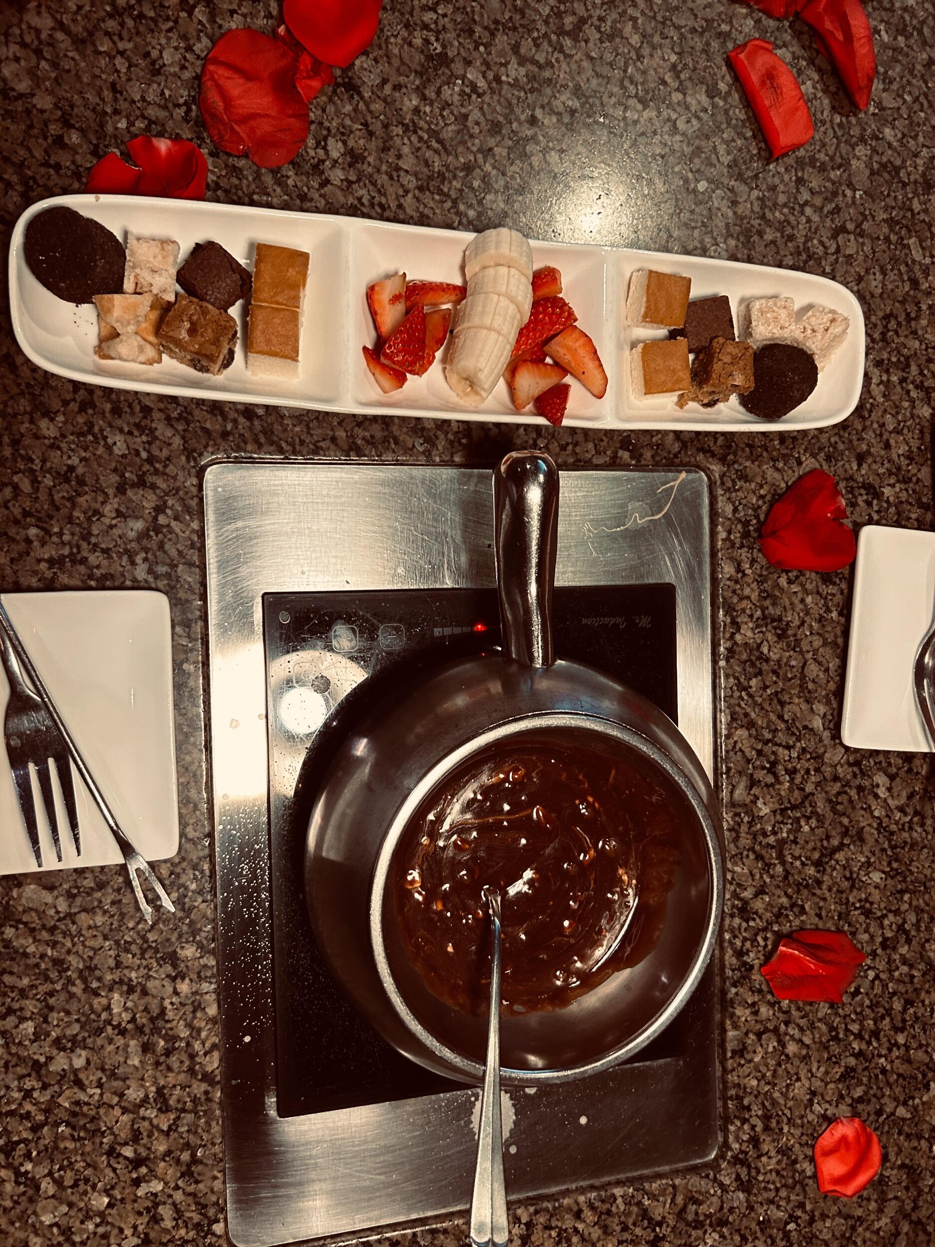 Cade and Analia's One Year Anniversary. The couple celebrated by having a fun day in the cities with a delicious lunch and nummy desert at The Melting Pot.